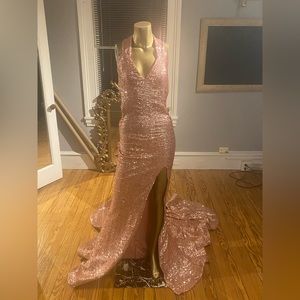 This is a custom rose gold prom dress. It was worn one time.
